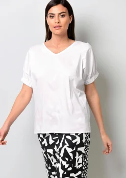 Bluse mit breitem Bündchen am Ärmel