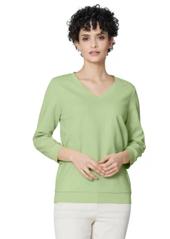 Sweatshirt mit 3/4-langen Ärmeln.